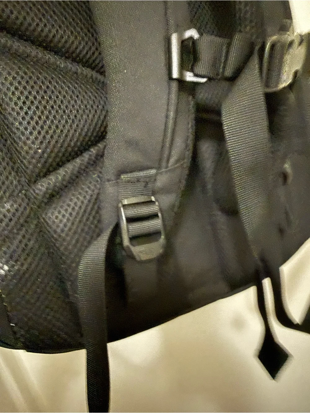 The North Face Two-Tone Beige and Black Backpack with Bungee Front